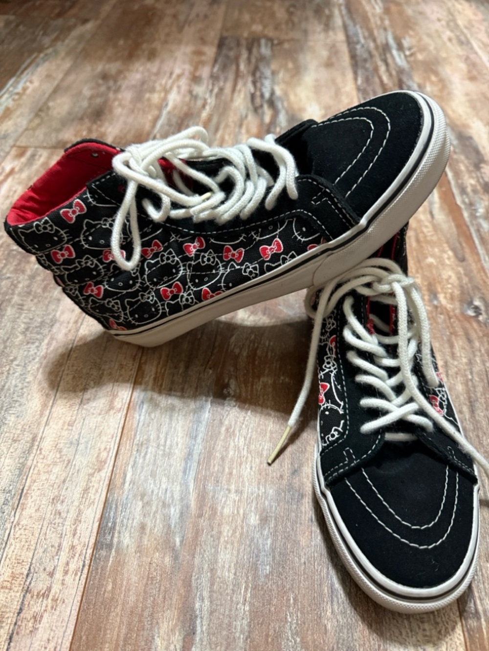 Vans Black High-Top Sneakers with Hello Kitty  and Cartoon Bow Print